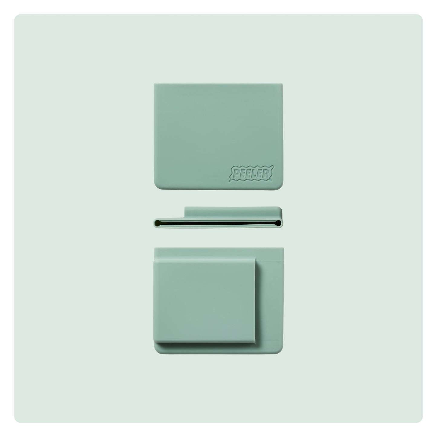 A sage-green silicone slim wallet laid flat, showing the front, side and back with the 'Peeler' logo embossed in the corner.